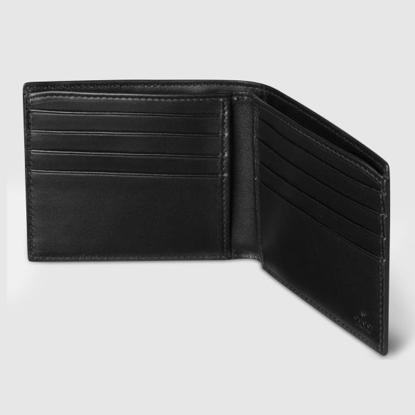Кошелек Gucci Maxi GG bi-fold wallet.