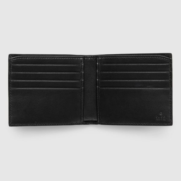 Кошелек Gucci Maxi GG bi-fold wallet.